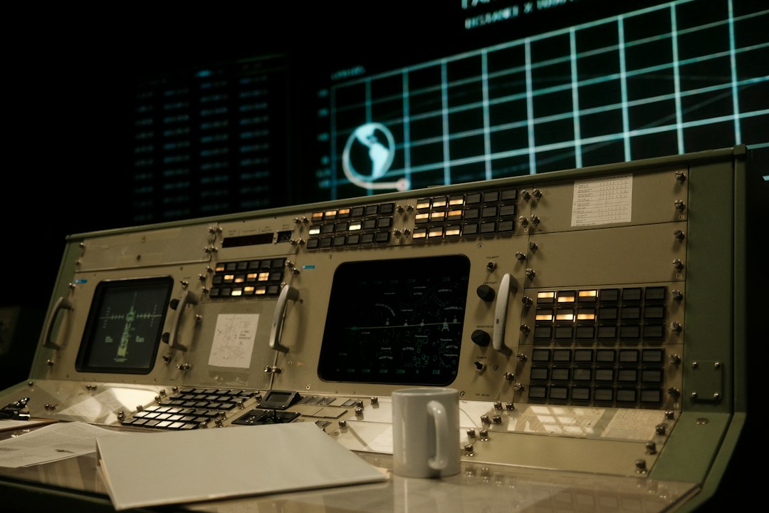 Modern mission control room with illuminated screens, used to illustrate the fictional Clocker SAS control centre